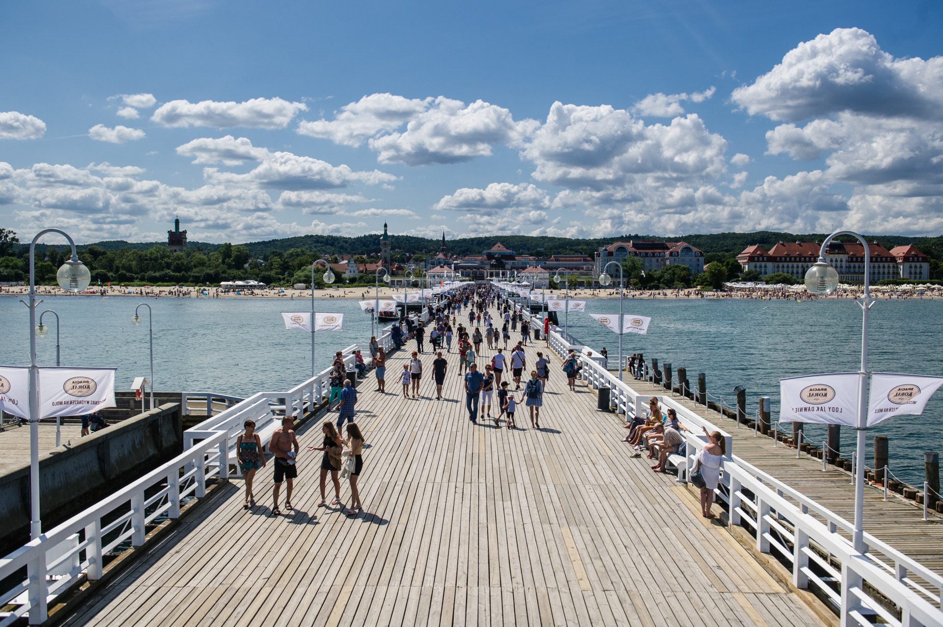 Sopot’s wooden Molo pier stretching toward its sunny Baltic beach