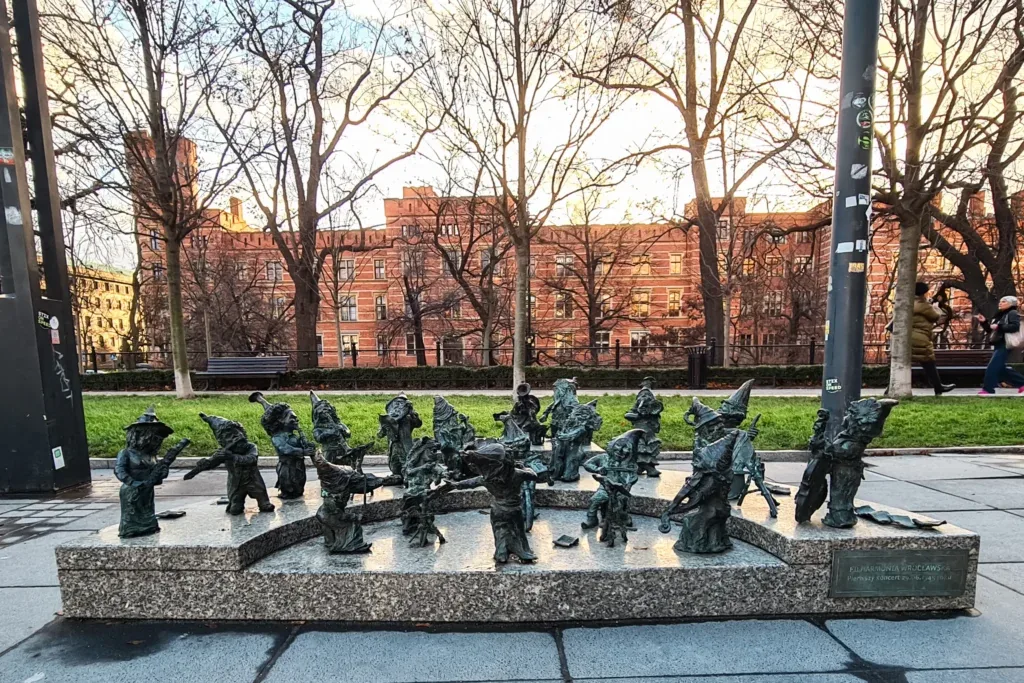 Small bronze dwarf sculptures on a Wrocław street