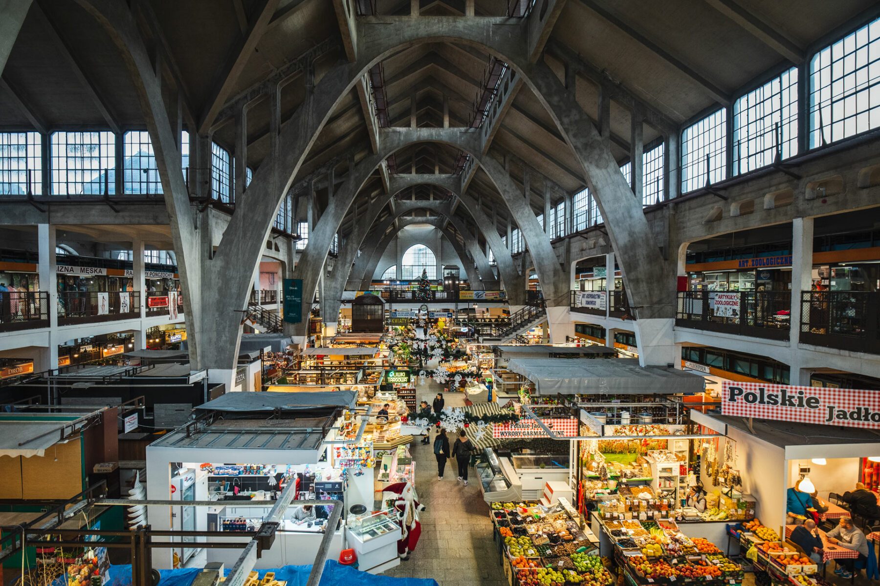 Produce stands inside Wrocław Market Hall