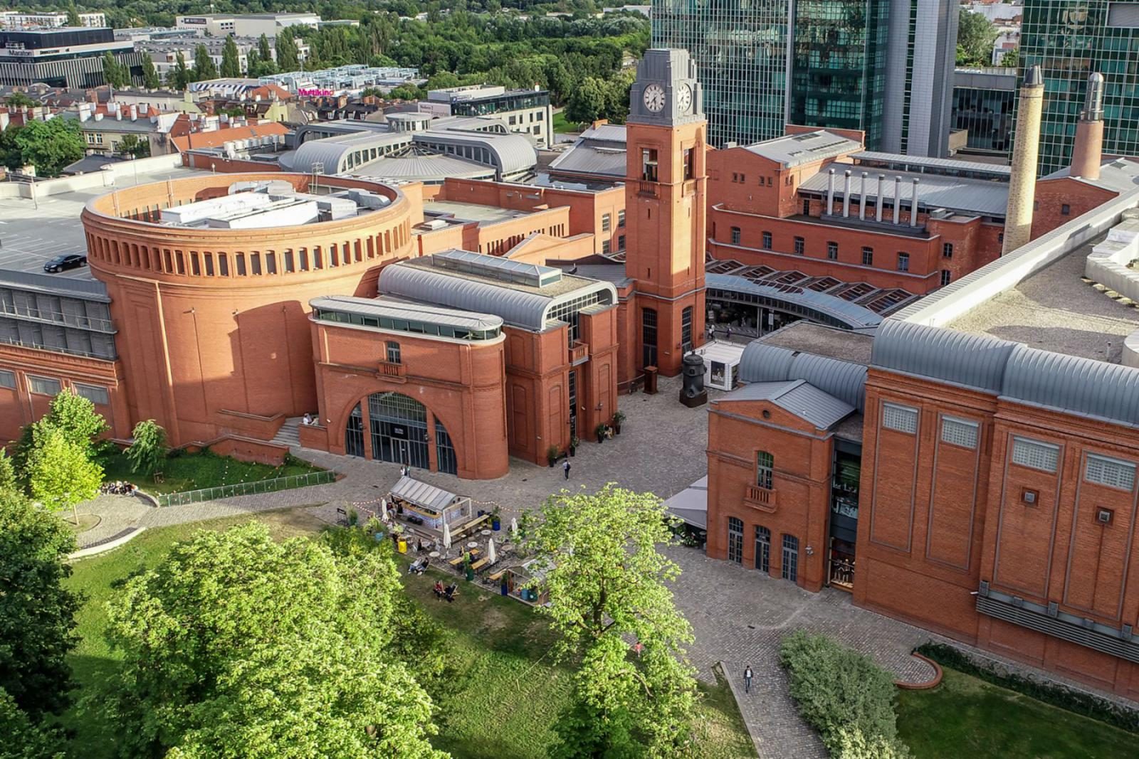 Brick industrial architecture and courtyards at Stary Browar in Poznań